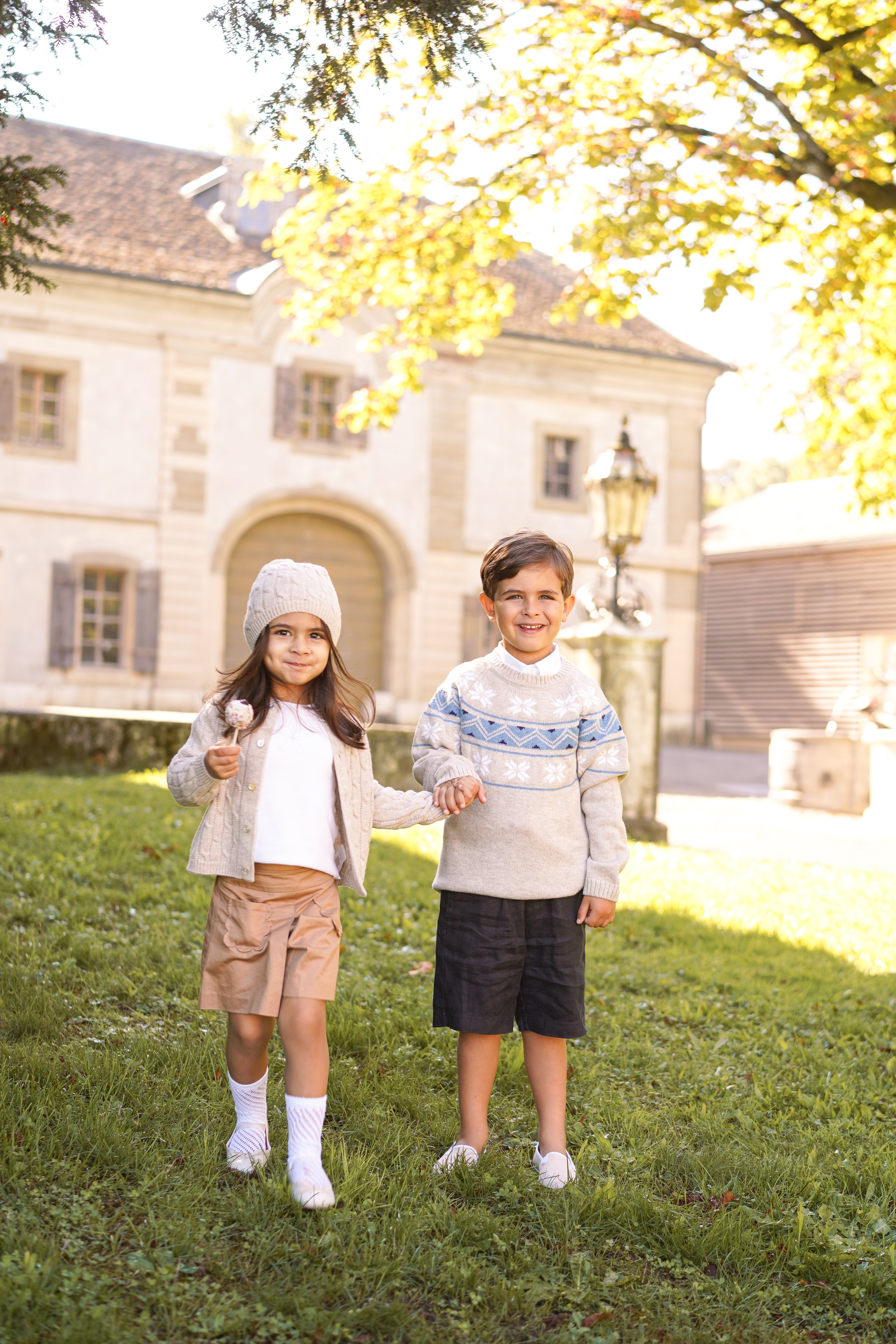 Children's cable knit cardigan in pure ultrafine merino wool