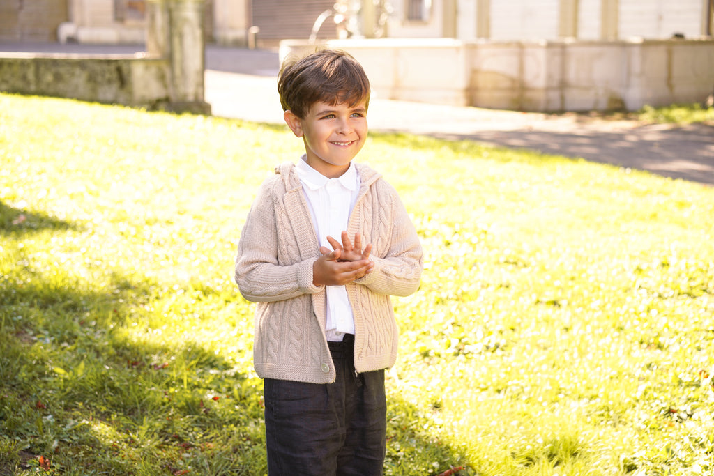 Children's hooded cardigan with braids in pure ultrafine merino wool