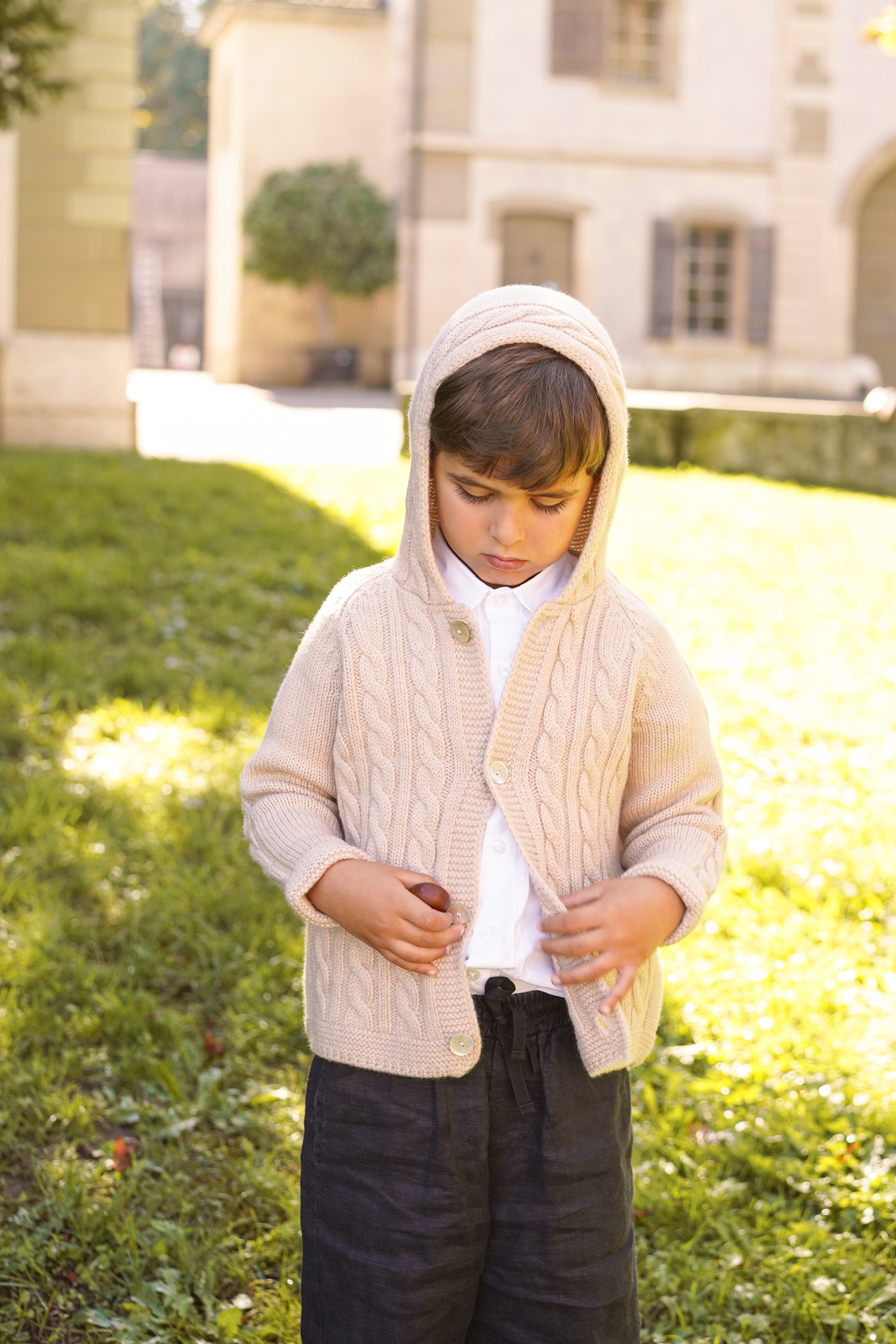 Children's hooded cardigan with braids in pure ultrafine merino wool