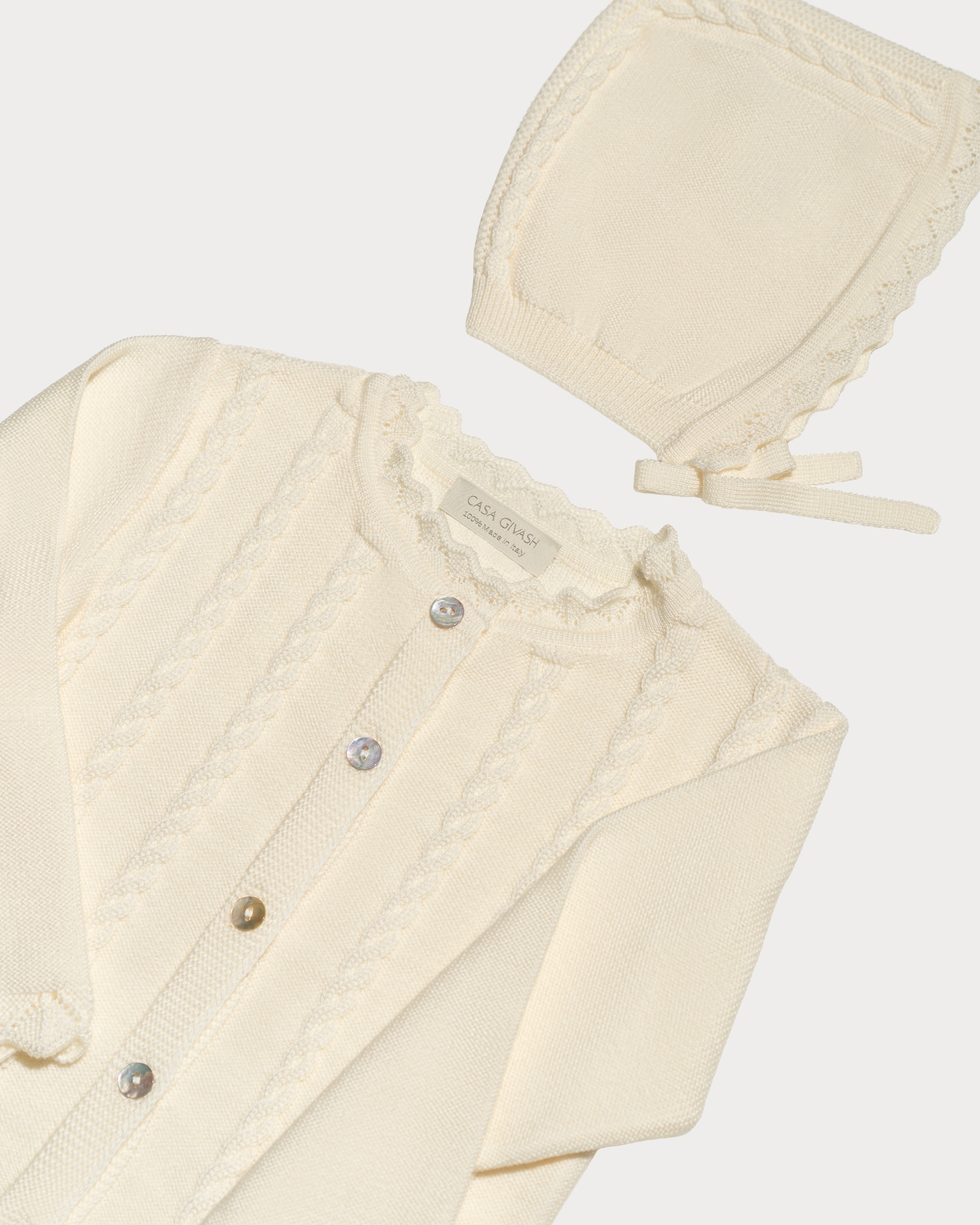 Baby girl's cardigan with braids in pure merino wool