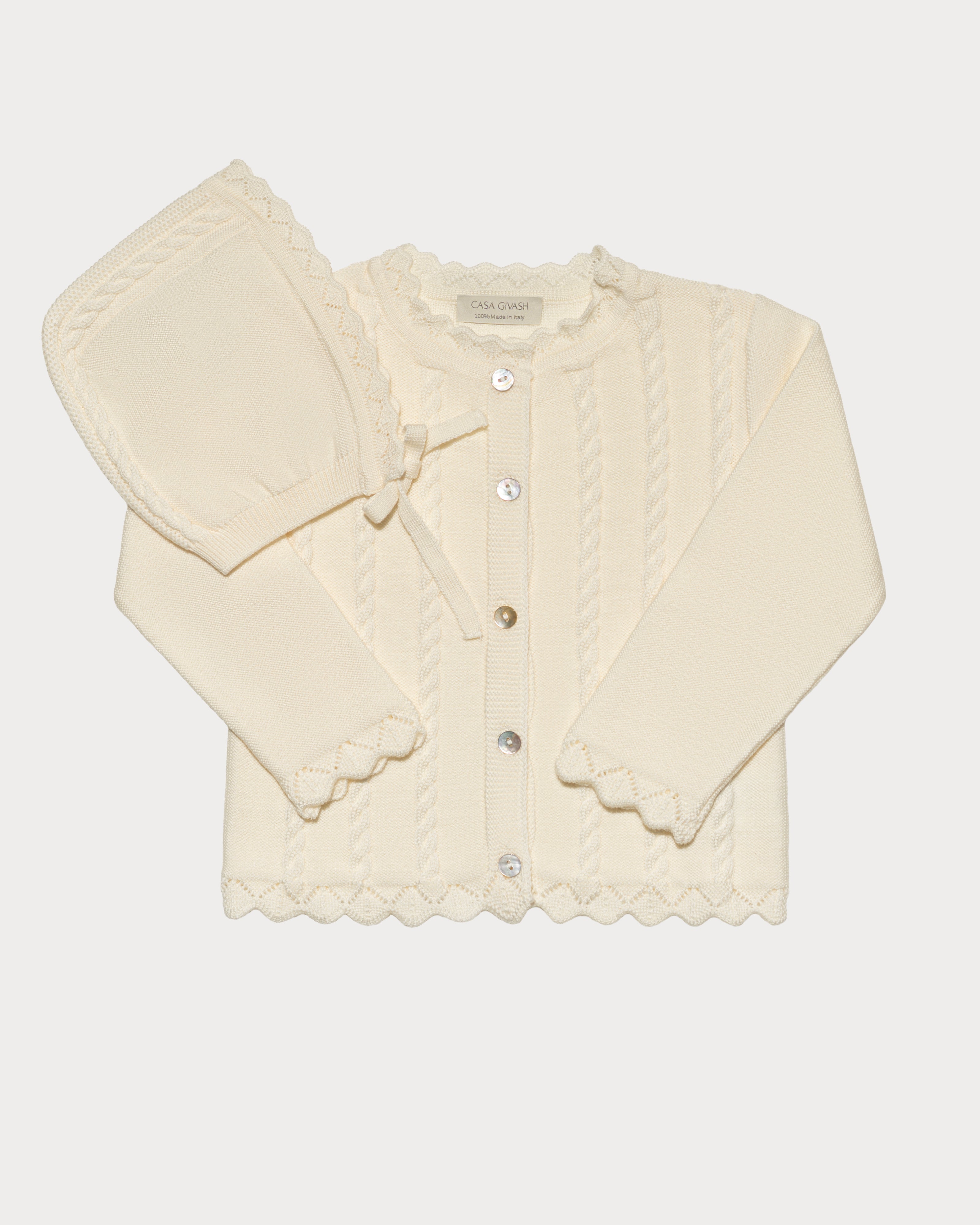 Baby girl's cardigan with braids in pure merino wool